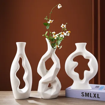 Креативные, простые керамические вазы с отверстиями, элегантная простая белая керамическая посуда для сухих цветов, чувство дизайна, элитная мебель для дома